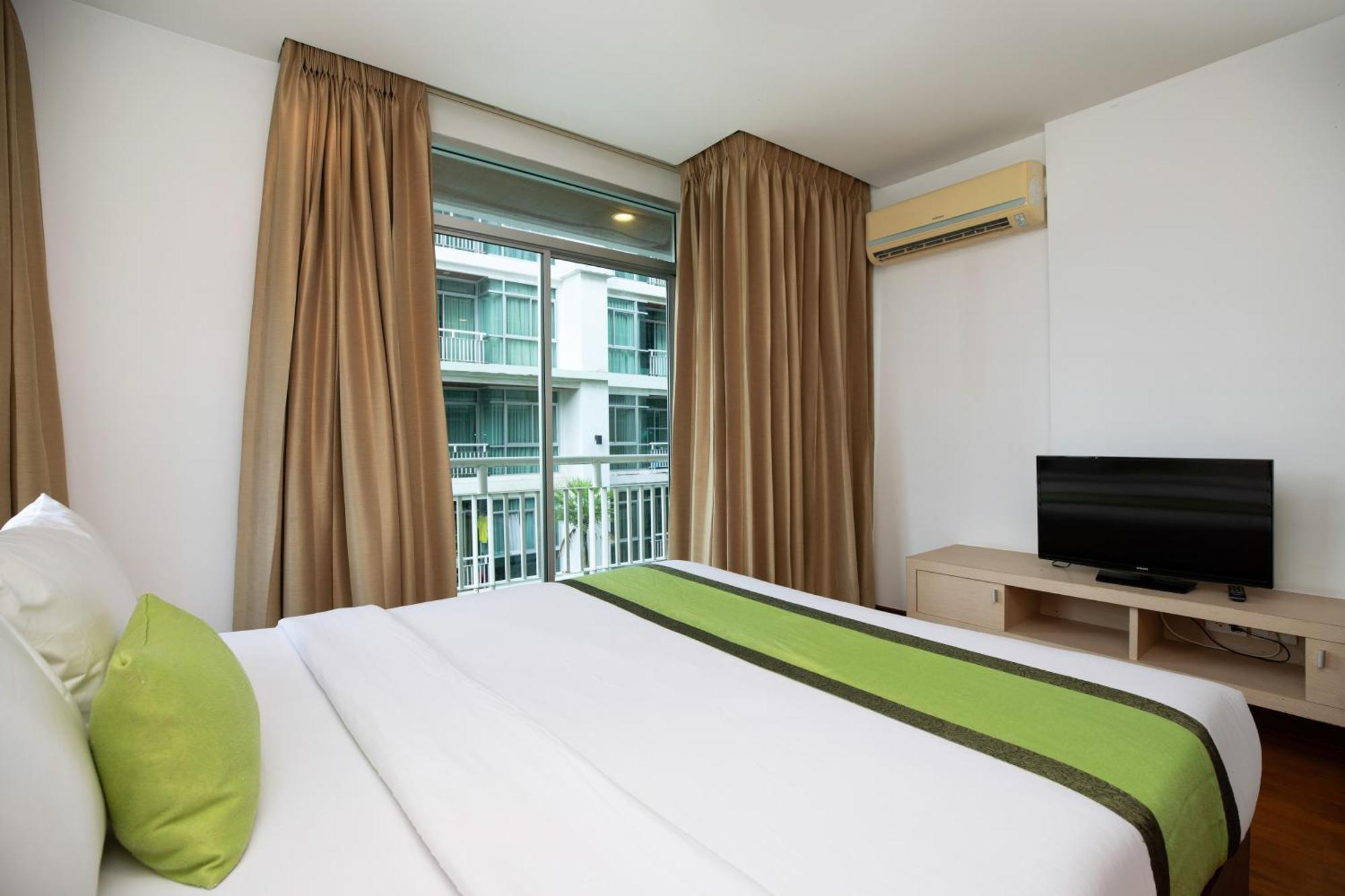 Icheck Inn Residences Patong Exterior photo